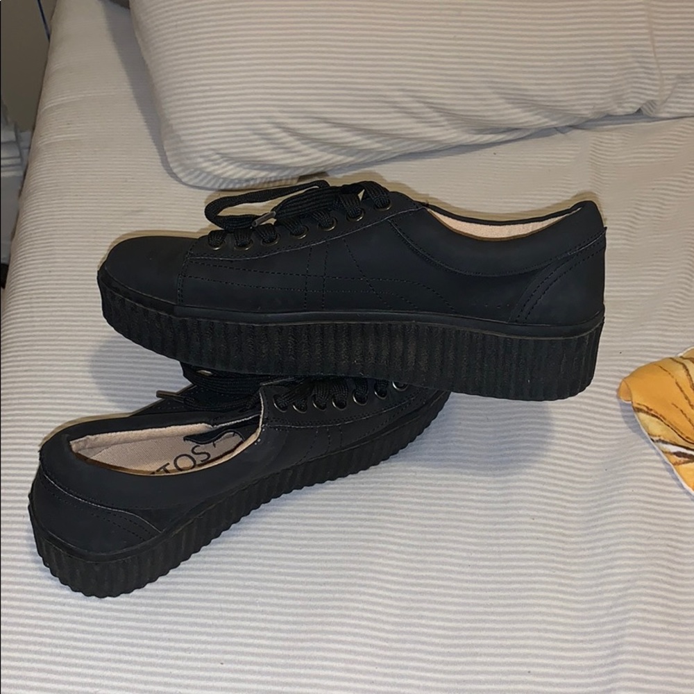 Black platform sneakers